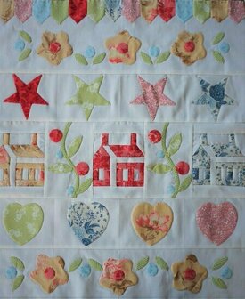 Miniquilt met applicaties en huisjes